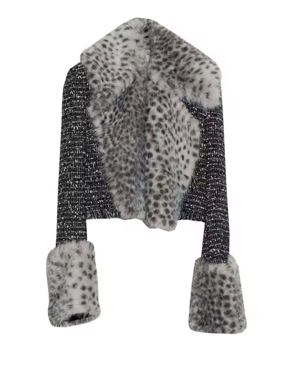 Black knit beanie with white leopard print pattern on a white background