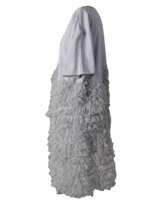 Gray ruffled dress on a white background